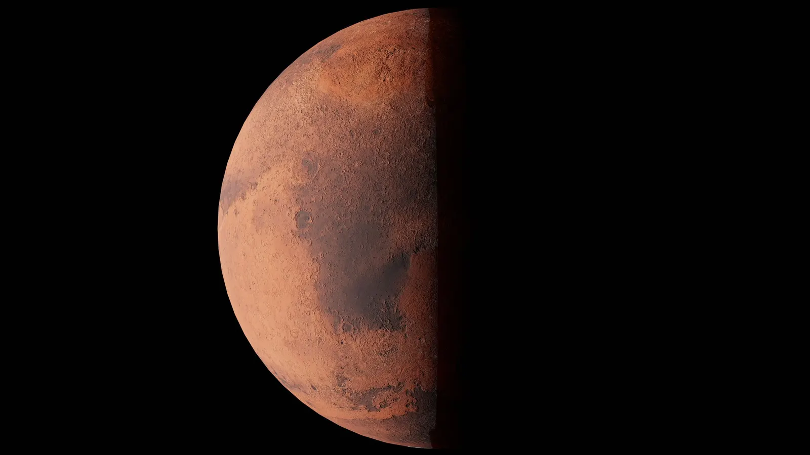 A félig megvilágított Mars a fekete űrben